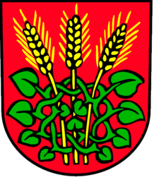 Roggwiler Wappen mit drei Roggenähren umrahmt von einem Lindenblätterkranz auf rotem Hintergrund