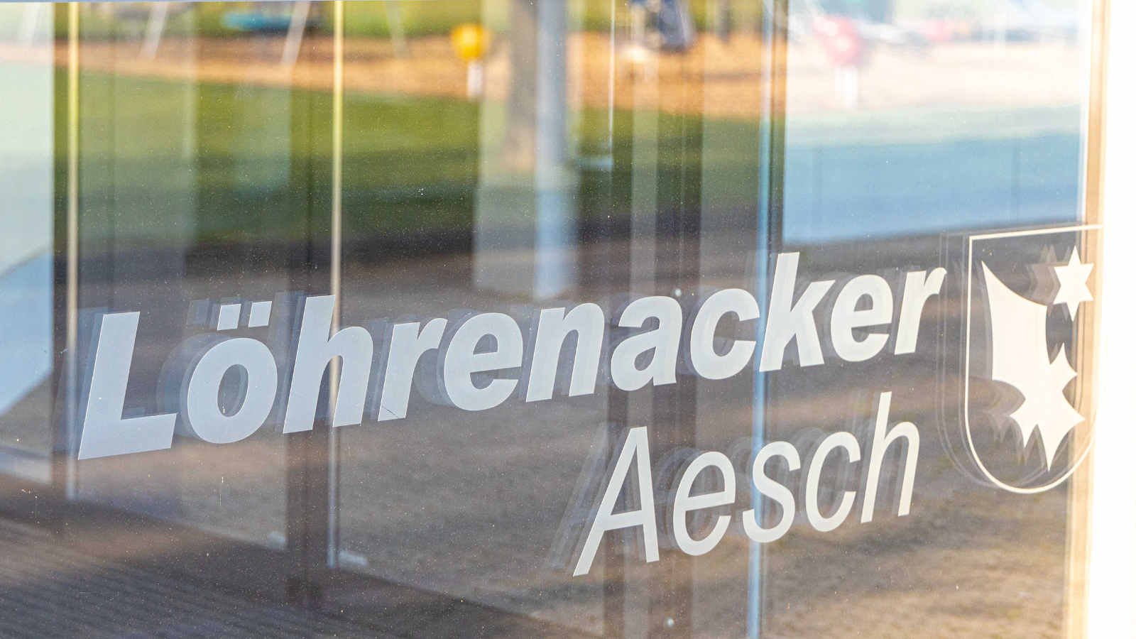 Beschriftete Scheibe der MZH Löhrenacker