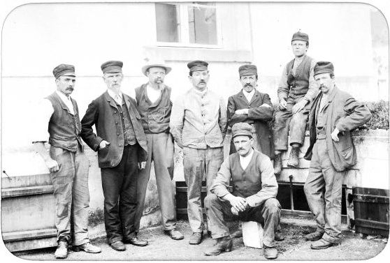 Spinnereiarbeiter um 1900