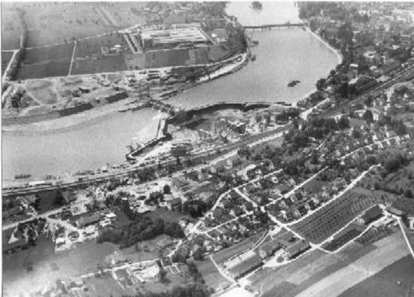Der Bau des Rheinkraftwerks (1961-1966). Beeindruckende Baugrube für das zukünftige Maschinenhaus.