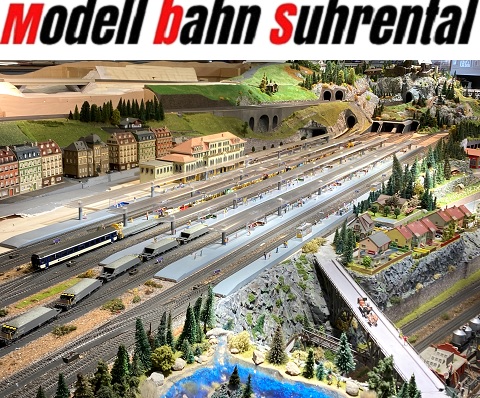 Modell Bahn Suhrental - Logo und Anlage Detailansicht Bahnhof, Tunnel und Landschaft