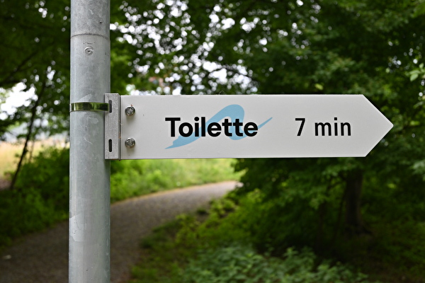 Wegweiser Toilette