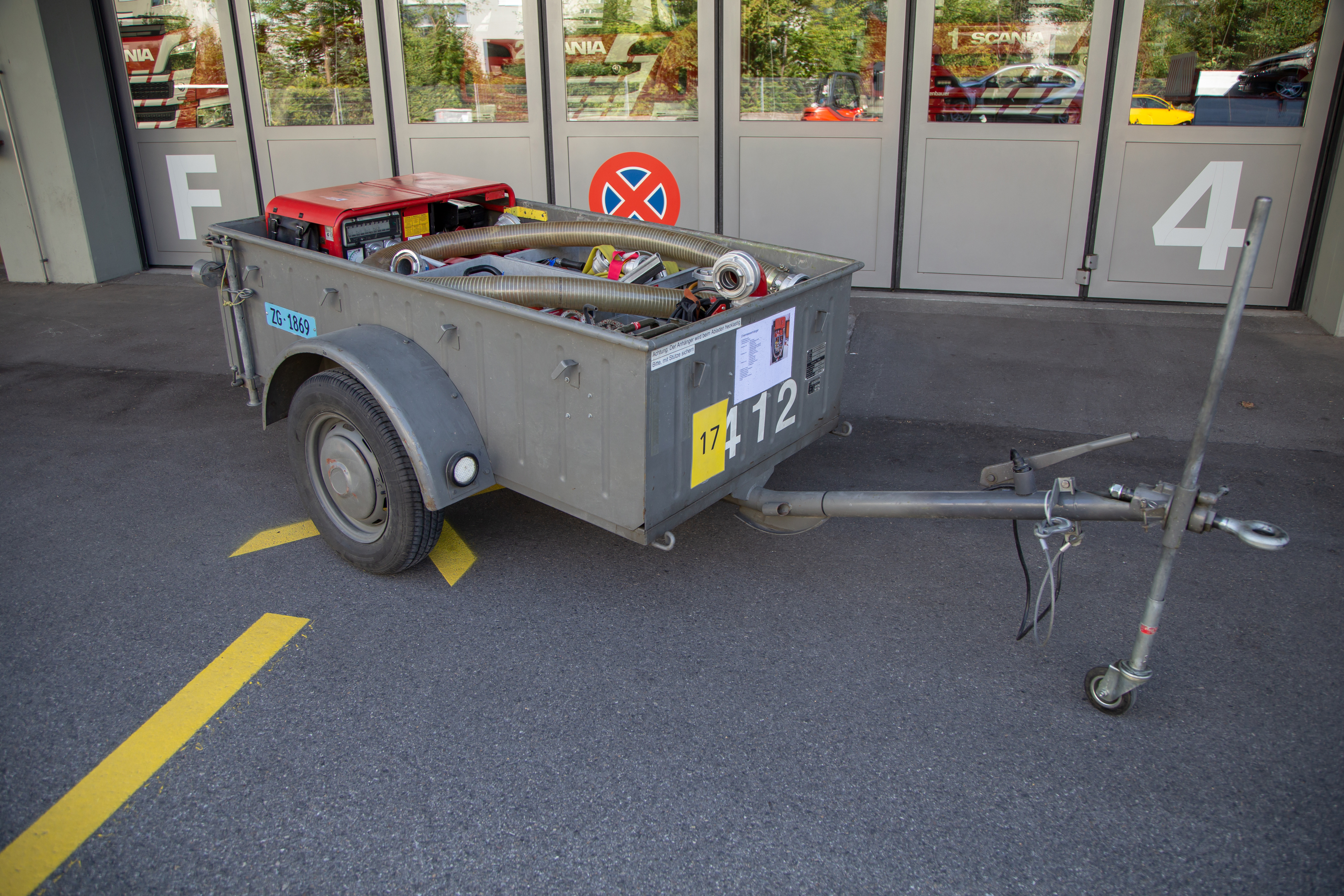 Aufbau: Schmutzwasserpumpe Chiemsee, Tauchpumpe, Wasserschaber, Elektroaggregat, Treibstoffkanister, Kabelrollen, Beleuchtungsmaterial, Transportleitung 75
